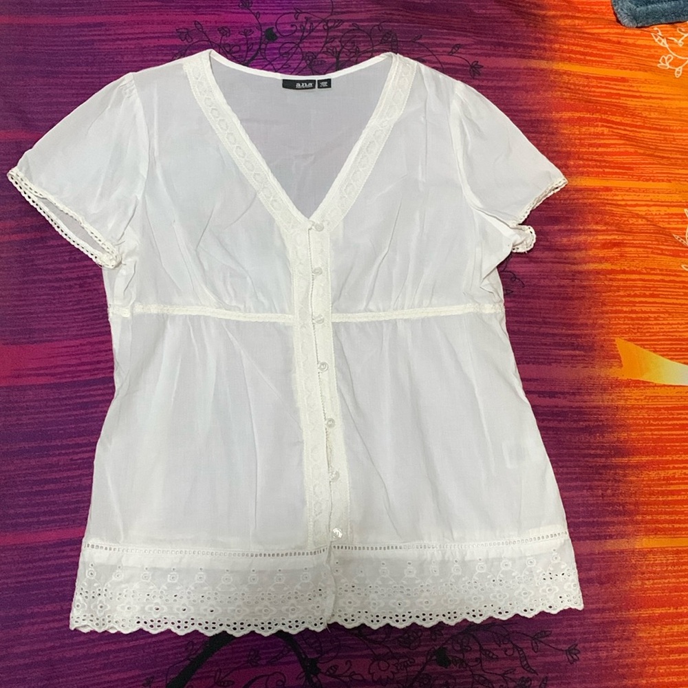 Boho style white top with lace accents